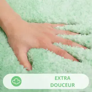 Alfombra de baño blanca y verde