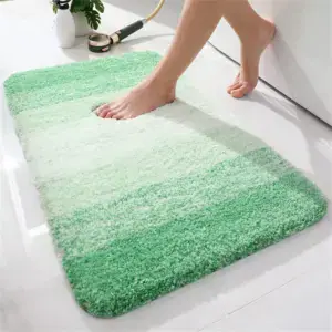 Alfombra de baño blanca y verde
