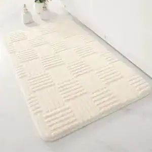 Alfombra de baño crema