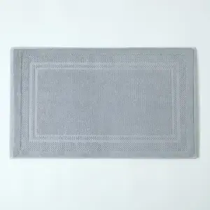 Alfombra de baño de hotel en algodón
