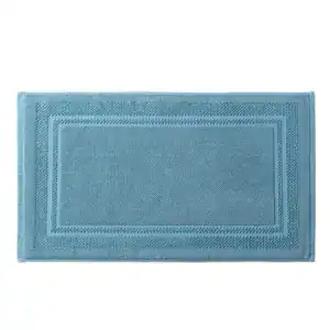 Alfombra de baño de hotel en algodón