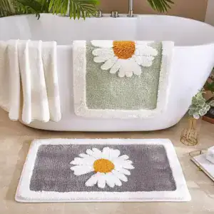 Alfombra de baño gris claro con estampado de flores