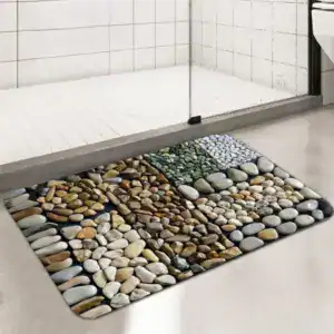 Alfombra de baño gris con piedras