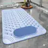 Alfombra baño con textura de masaje y zona de cepillado en azul claro.