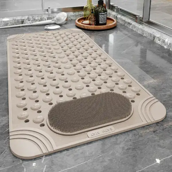 Alfombra para ducha o bañera con textura de puntos y área de cepillado.