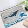Alfombra baño con diseño de ballena y olas estilo ukiyo-e.