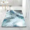 Alfombra de baño gris oscuro efecto mármol
