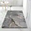 Alfombra de baño gris oscuro efecto mármol