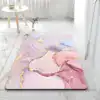 Alfombra de baño gris oscuro efecto mármol