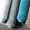 Alfombra de baño de hotel en algodón