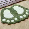 Alfombra de baño con forma de pies