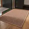 Alfombra de baño trenzada