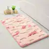 Alfombra esponjosa de baño
